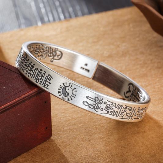 Antique Tai Chi Bracelet – silver cuff with engraved talisman and yin-yang symbol on wood block, balance protection