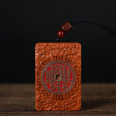 Shan Gui Wood Pendant – jujube wood front red talisman script, black cord red bead detail