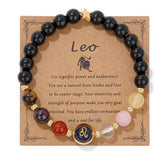 Zodiac Crystal Bracelet – Leo flat lay on kraft card with six healing stones and star charm