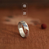 Koi Cloud Ring – Silver band with blue enamel koi fish and red cloud patterns on brown background, unisex luck jewelry