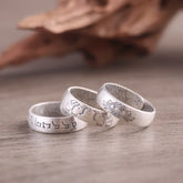 Sterling Silver Mantra Ring - three stacked bands on wood, lotus elephant and Tibetan, blessing