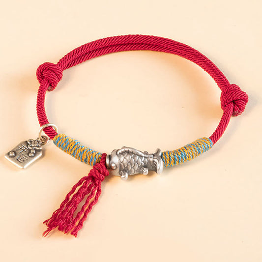 Silver Koi Bracelet – Front view of 999 sterling silver koi fish on red string