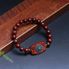 Sandalwood Six True Words Bracelet - Turquoise-centered mantra plaque on red wood beads, healing bracelet