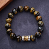 Tiger Eye Six True Words Courage Bracelet - full view on dark fabric, beaded stretch design