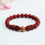 Cinnabar Double Pixiu Bracelet – red cinnabar beads with carved pixiu guardians and gold enamel fortune bead