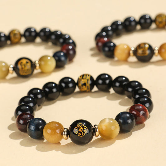 Black Onyx Tiger Eye Natal Buddha Bracelet - three stacked bracelets with gold zodiac charms