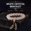 White Crystal Mantra Bracelet – Frosted beads with tassel on dark slate, meditation jewelry