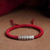 Silver Mantra Rope Bracelet – Red braided cord with antique silver bead engraved with Chinese blessing, lucky bracelet