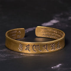 Om Mani Padme Hum Copper Cuff Bangle – Golden embossed script on black marble, engraved copper bangle