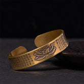 Heart Sutra Lotus Copper Brass Peace Cuff Bracelet – lotus relief with scripture on dark backdrop, zen harmony