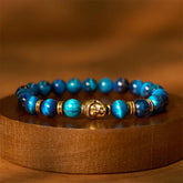 Blue Green Red Tiger Eye Buddha Bracelet – Front view of tri color beaded band with Buddha accent charm