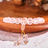 Om Mani Padme Hum Bracelet - Translucent white crystal beads on golden cord with tassel, meditation jewelry