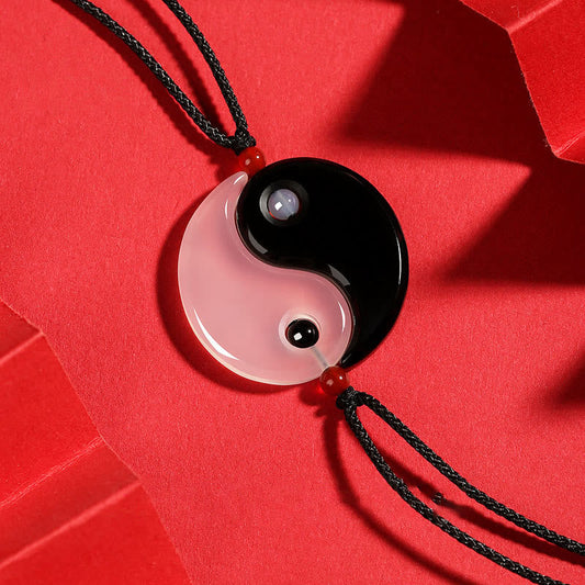 Black Onyx White Agate Yin Yang Necklace - Split obsidian and rose quartz interlocking yin-yang couple pendant set on vibr...