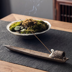 Fisherman Zen Ceramic Incense Burner – Top view of fishing boat holder with monk figure and smoke trail, ceramic decor