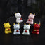 Deer Ceramic Incense Burner – Six color variants with gold antlers on dark surface, white one holding lit incense, ceramic burner