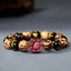 Bodhi Seed Bagua Yin Yang Bracelet – Octagonal red yin-yang medallion with black mantra beads, feng shui