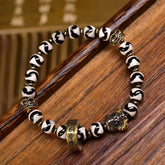 Tibetan Dzi Bead & Copper Om Mani Padme Hum Bracelet – Tiger stripe Dzi beads with skull charm on wood, dzi bead bracelet