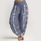 Cotton Mandala Om Harem Pants – slate blue with white Sanskrit print, 3/4 angle on model, boho yoga pants
