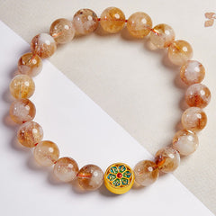 Sterling Silver Citrine Bracelet – top-down flat lay, golden citrine stones with mandala enamel bead, beaded stretch bracelet