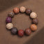 Sandalwood Dragon Phoenix Zodiac Bracelet – multi-wood beads overhead dark brown surface, Balance