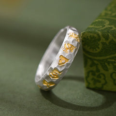 999 Silver Hammered Om Ring – Gold Sanskrit characters on hammered silver with decorative box, spiritual ring
