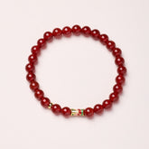 Natural Red Agate Koi Fish Bracelet – red agate beads with gold koi charm, top-down, confidence
