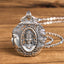 Copper Buddha Devil Pattern Necklace – front pendant on black cord, Buddhist spiritual jewelry