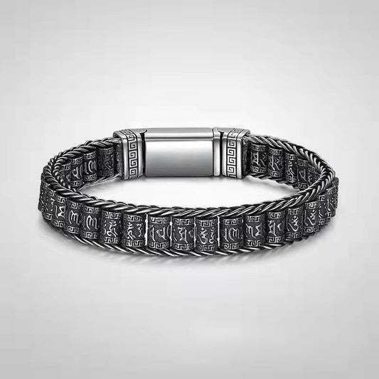 Om Mani Padme Hum Bracelet – three-quarter view on gray, copper mantra bracelet