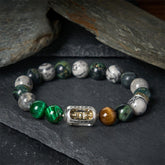 Grey Jasper Tiger Eye Bracelet – Styled on dark slate with mixed stone beads and silver mantra charm, men's bead bracelet