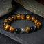 Tiger Eye Silver Sheen Obsidian Buddha Bracelet – front on slate with tiger eye silver Buddha bead and obsidian, front-view