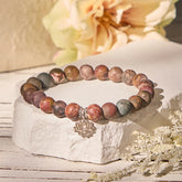 Picasso Jasper Lotus Bracelet – earthy beaded bracelet on white stone with dried flowers, jasper healing bracelet
