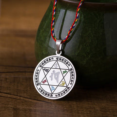 Om Mani Padme Hum Pendant Necklace – six-pointed star engraving with mantra syllables on multicolor braid, meditation amulet