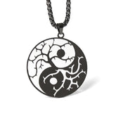 Yin Yang Branches Necklace – Black pendant on white studio background, yin yang jewelry