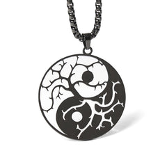 Yin Yang Branches Necklace – Black pendant on white studio background, yin yang jewelry