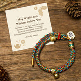 Zakiram Om Mani Padme Hum String Bracelet – multicolor braided cord with gold charms on rustic wood, Tibetan bracelet