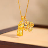 24K Gold Plated Pixiu Cross Dorje Vajra Necklace – pendant close-up warm beige background, gold wealth necklace