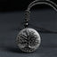 Tree of Life Black Obsidian Necklace – round pendant with engraved tree detail on gray cord, spiritual jewelry
