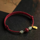 Hetian Jade Cinnabar Bracelet – braided red cord with carved cinnabar bead, jade accents and gold Fu charm, red string jewelry
