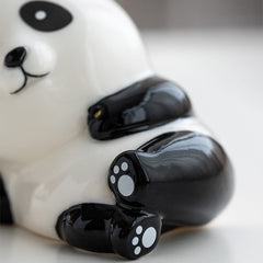 Panda Ceramic Incense Burner - Close-up of panda paw pads on glossy black ceramic, zen accent