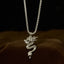 Copper Dragon Necklace – Dragon pendant on box chain, dark brown backdrop, bold