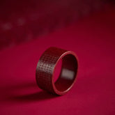 Cinnabar Heart Sutra Om Mani Padme Hum Blessing Ring – deep red band with engraved text on crimson velvet, cinnabar ring