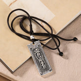 Namo Amitabha Copper Rope Necklace - Antique pendant on braided cord over old book, Buddhist jewelry