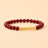 Cinnabar Om Mani Padme Hum Bracelet – Gold mantra cylinder on deep red beads, Buddhist prayer bracelet