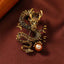 Domineering Dragon Pearl Strength Alloy Brooch – gold dragon with amber stones and peach pearl on burgundy velvet, power