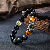 Natural Black Obsidian PiXiu Tiger's Eye Bracelet – close-up silver PiXiu, obsidian and tiger eye beads, feng shui wealth