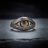 Dzi Evil Eye Ring – Copper ring with sculpted evil eye, dark pupil in tan agate stone, adjustable