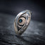 Dzi Evil Eye Ring – Antiqued silver eye ring with blue pupil stone on dark slate, protection ring