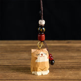 Wood Cat Keychain - Tan carved cat with Bodhi seed and gold mantra bead, red and black tassel charm