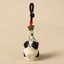 Wood Dog Keychain – Black and white carved dog with bronze flower charm and colorful stone beads, handcrafted