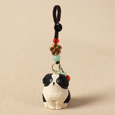 Wood Dog Keychain – Black and white carved dog with bronze flower charm and colorful stone beads, handcrafted